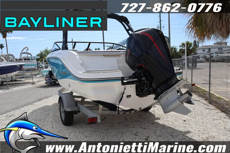 Slide: The Image of 2026 Bayliner V20 boat on trailer at Antonietti Marine dealership. - 4