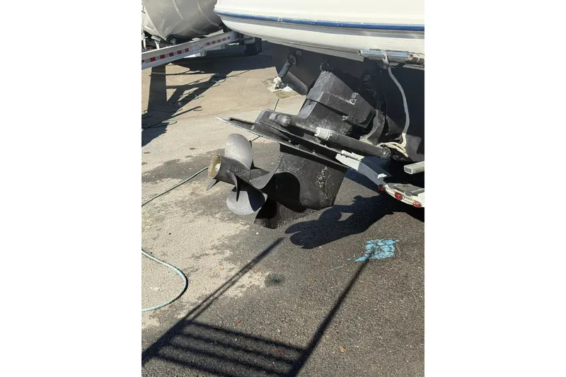 Slide: The Image of Bayliner 2655 Ciera 2003 boat propeller and stern drive on a trailer. - 11