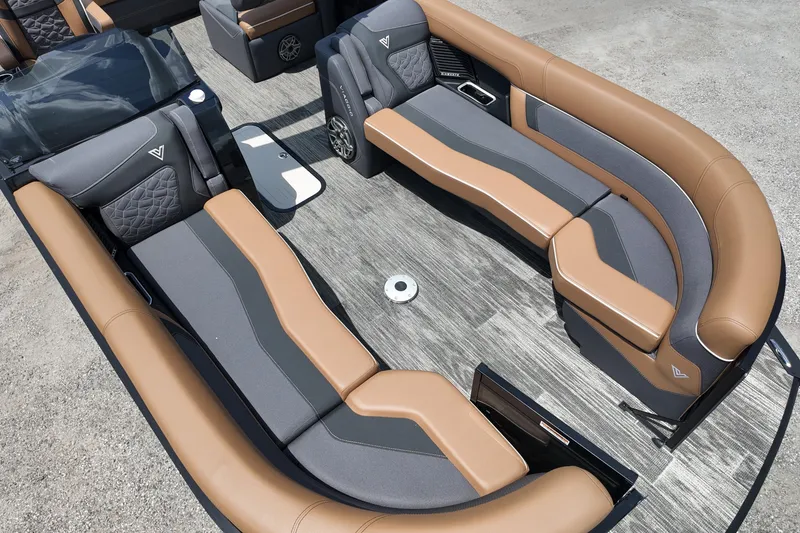 Slide: The Image of Luxurious seating on 2026 Viaggio Diamante 24 S pontoon boat, featuring elegant brown and gray upholstery. - 9