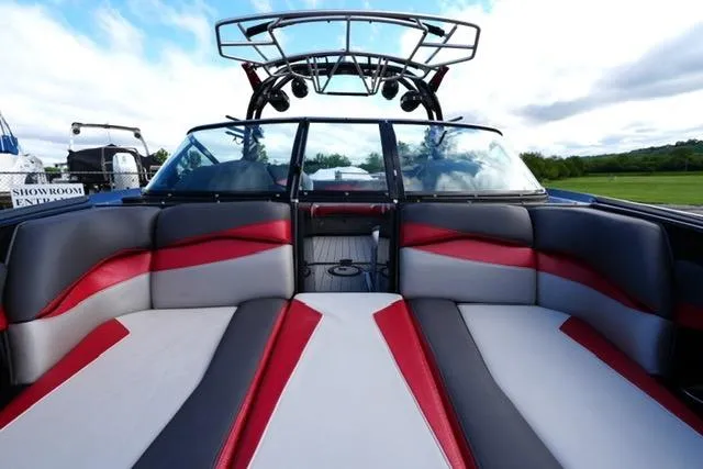 Slide: The Image of 2014 Supra Launch SA 350-550 boat interior with red and gray seating. - 11