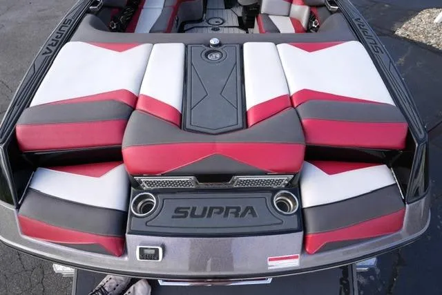 Slide: The Image of 2014 Supra Launch SA 350-550 boat interior with red, white, and gray seating. - 17