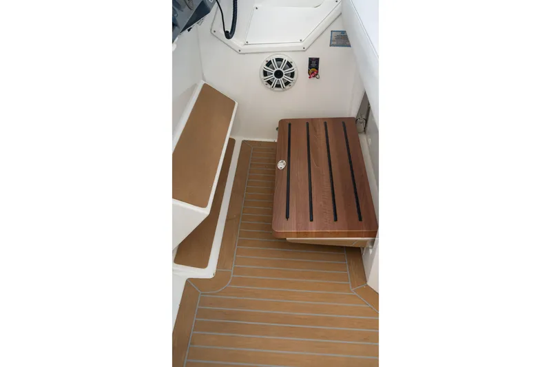 Slide: The Image of 2018 Cruisers Yachts 390 Express Coupe interior with wooden flooring and speaker system. - 43
