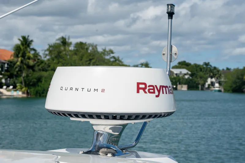 Slide: The Image of Raymarine Quantum 2 radar on 2018 Cruisers Yachts 390 Express Coupe, with scenic water backdrop. - 45