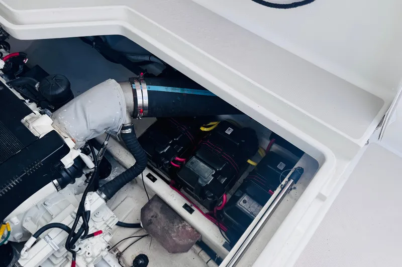 Slide: The Image of Engine compartment of a 2007 Back Cove 29 boat, showcasing mechanical components. - 36
