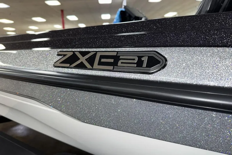 Slide: The Image of 2026 Skeeter ZXE21 boat with metallic finish and model emblem. - 11