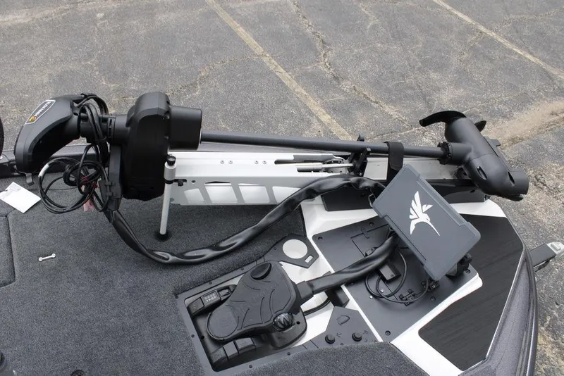 Slide: The Image of 2026 Skeeter ZXE21 boat with advanced trolling motor and control panel on deck. - 7