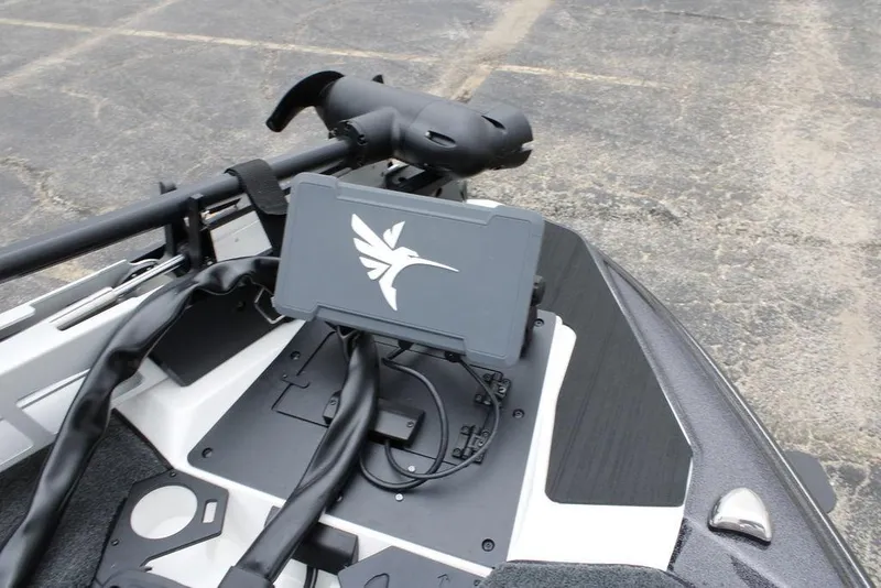 Slide: The Image of 2026 Skeeter ZXE21 boat dashboard with mounted electronic device and trolling motor. - 8
