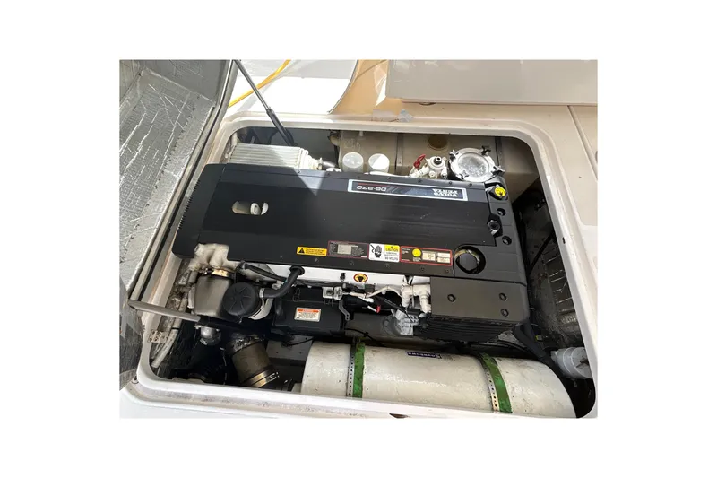Slide: The Image of Engine compartment of a 2009 Hunt Yachts Harrier 29, featuring a Volvo Penta engine. - 20