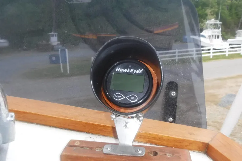 Slide: The Image of HawkEye depth finder on 1983 Grand Banks 36 Classic boat dashboard. - 10