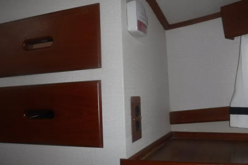 Slide: The Image of Interior of 1983 Grand Banks 36 Classic with wooden drawers and electrical outlet. - 28