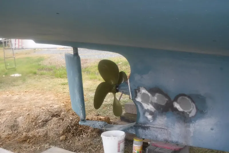 Slide: The Image of Propeller and rudder of 1983 Grand Banks 36 Classic boat on land. - 3