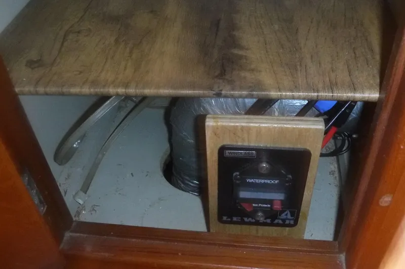 Slide: The Image of 1983 Grand Banks 36 Classic interior showing Lewmar windlass control panel. - 34