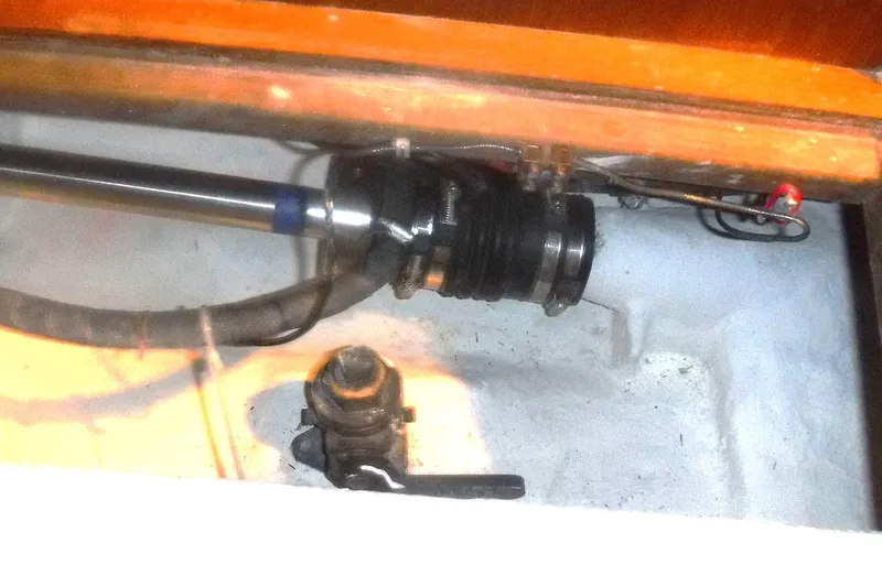 Slide: The Image of Engine compartment of 1983 Grand Banks 36 Classic, showcasing mechanical components and fittings. - 43