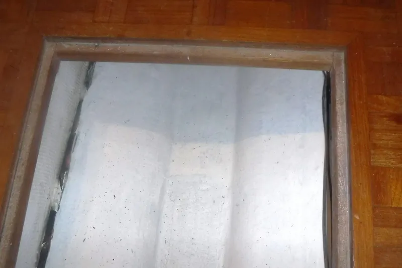 Slide: The Image of Inspection hatch on 1983 Grand Banks 36 Classic boat, showing interior details. - 44
