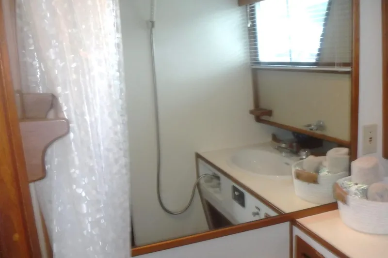 Slide: The Image of Bathroom interior of 1983 Grand Banks 36 Classic yacht with sink and shower. - 46