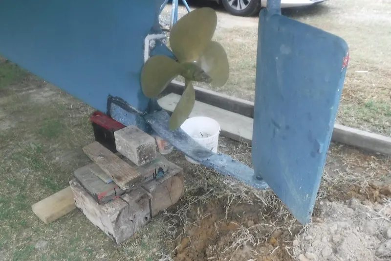 Slide: The Image of Propeller and rudder of 1983 Grand Banks 36 Classic on wooden blocks. - 5