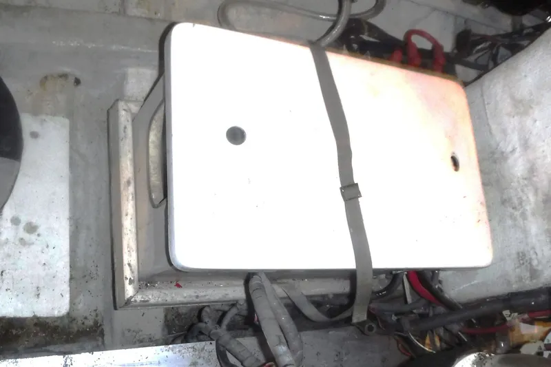 Slide: The Image of Engine compartment of 1983 Grand Banks 36 Classic with secured battery box. - 50