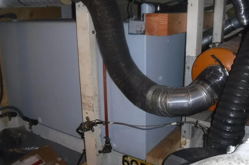 Slide: The Image of Engine room of 1983 Grand Banks 36 Classic with visible ductwork and equipment. - 59