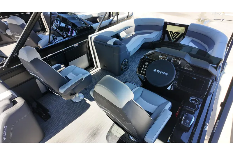 Slide: The Image of Interior of 2026 Viaggio Diamante D22U boat with modern seating and steering console. - 6