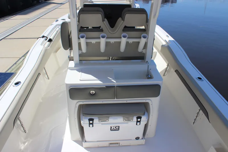 Slide: The Image of 2026 Key West 249 FS boat interior with seating and storage compartments. - 11