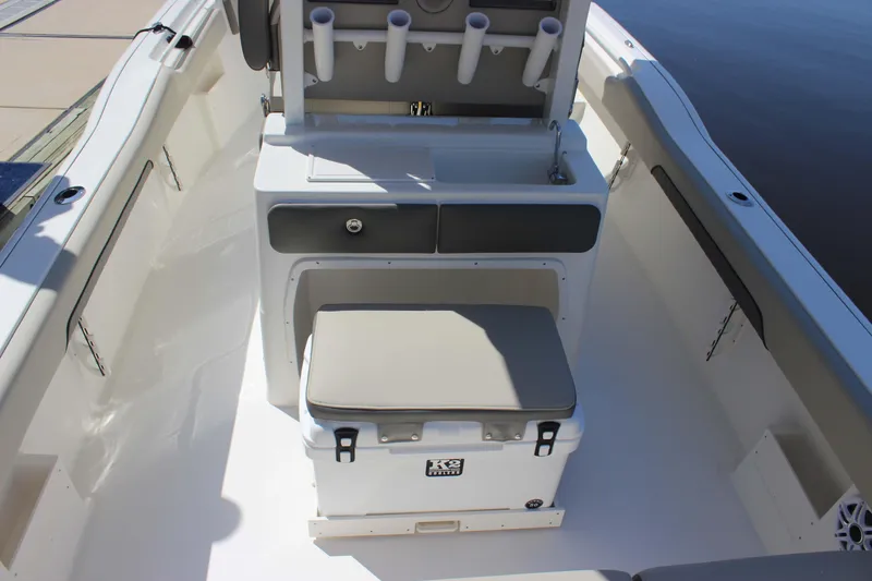 Slide: The Image of 2026 Key West 249 FS boat interior with seating and storage compartments. - 12