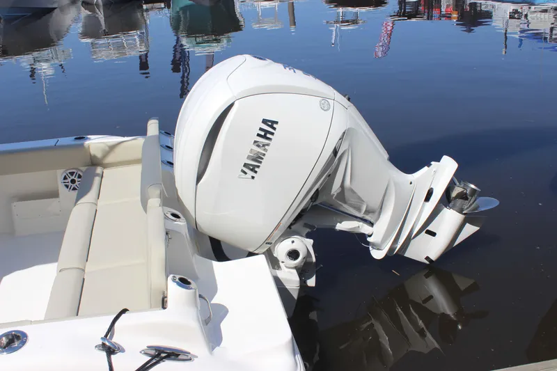 Slide: The Image of 2026 Key West 249 FS boat with Yamaha outboard motor in calm water. - 14