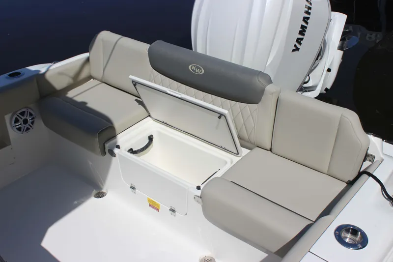 Slide: The Image of 2026 Key West 249 FS boat seating with storage compartment and Yamaha engine. - 15