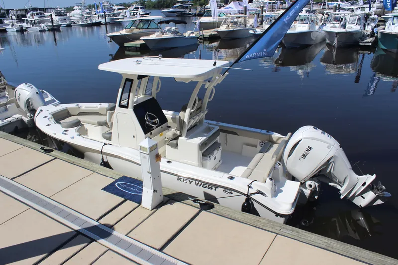 Slide: The Image of 2026 Key West 249 FS boat docked at marina with Yamaha outboard engine. - 19