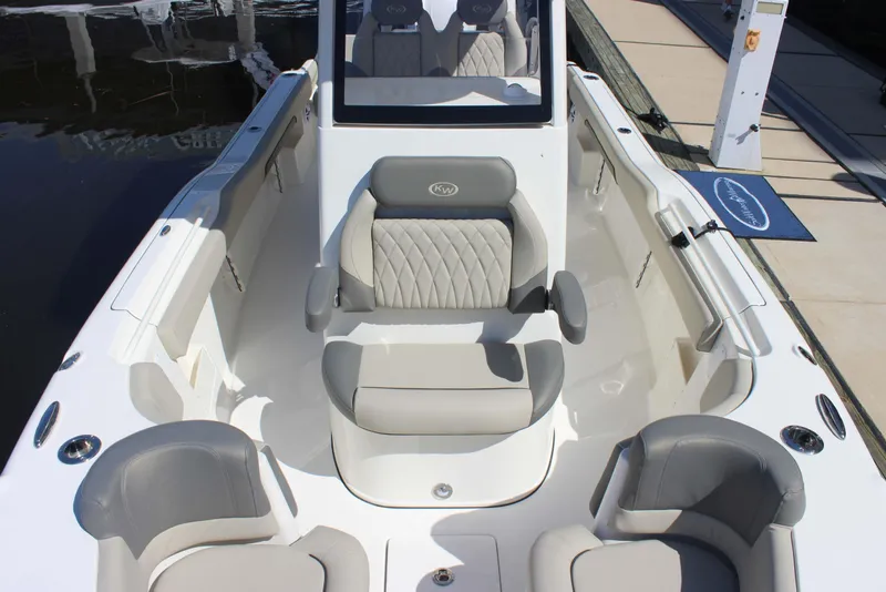 Slide: The Image of 2026 Key West 249 FS boat interior with gray seating and modern design. - 3
