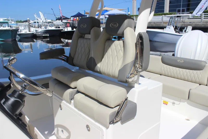 Slide: The Image of 2026 Key West 249 FS boat interior with luxurious seating and modern steering wheel. - 6