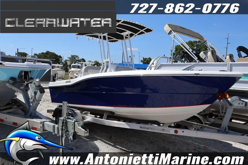 The Image of 2026 Clearwater 2000 Center Console boat on trailer at Antonietti Marine dealership. - 1