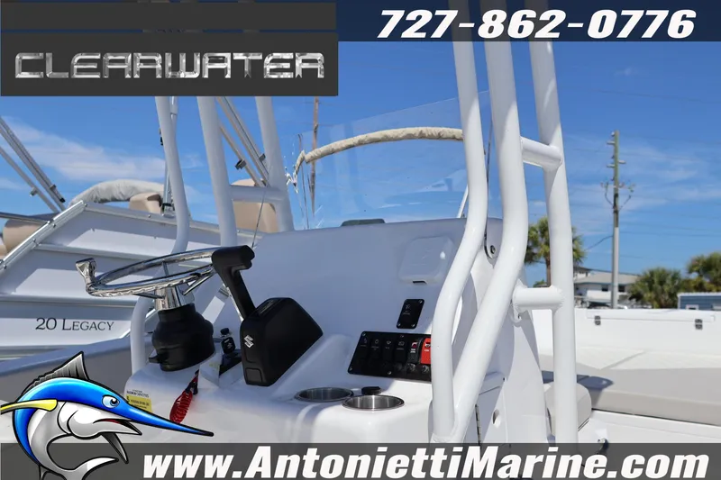 Slide: The Image of Clearwater 2000 Center Console boat, 2026 model, featuring steering console and controls. - 5