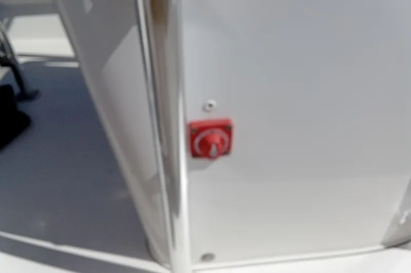 Slide: The Image of Red switch on a 2015 Key West 203 FS boat interior. - 15