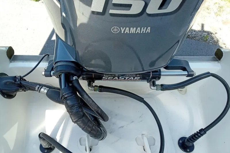 Slide: The Image of Yamaha outboard motor on 2015 Key West 203 FS boat with SeaStar hydraulic steering. - 25