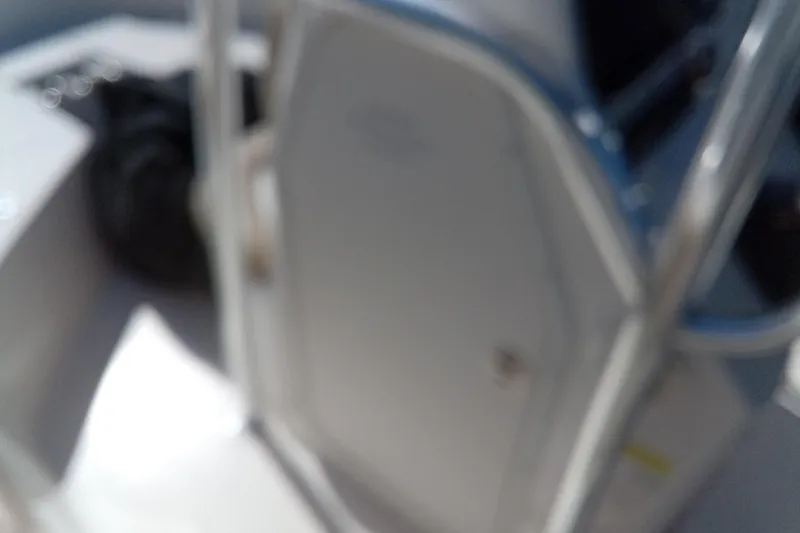 Slide: The Image of Blurry interior view of a 2015 Key West 203 FS boat. - 26