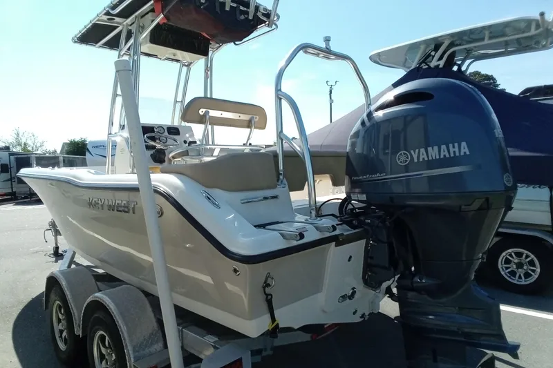 Slide: The Image of 2015 Key West 203 FS boat with Yamaha outboard motor on trailer. - 29