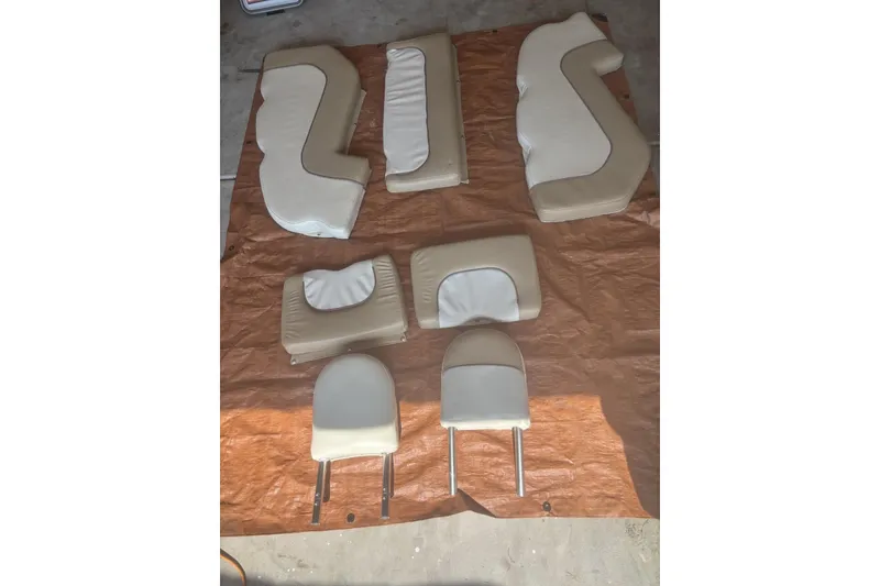 Slide: The Image of Cushion set for 2015 Key West 203 FS boat, displayed on a tarp. - 40