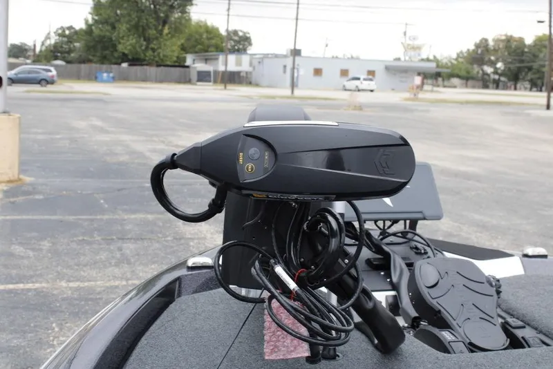 Slide: The Image of 2026 Skeeter ZXE21 boat with advanced trolling motor in a parking lot. - 18