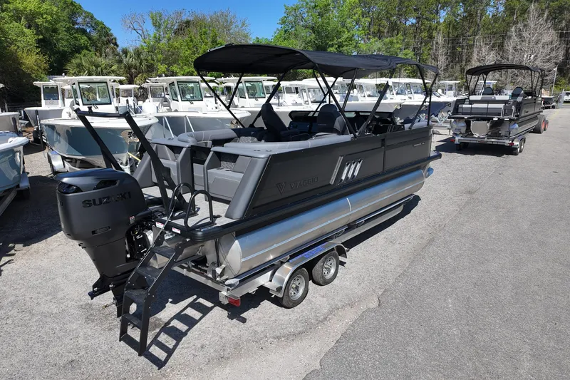 Slide: The Image of 2026 Viaggio Diamante 22UW pontoon boat with Suzuki engine on trailer. - 3