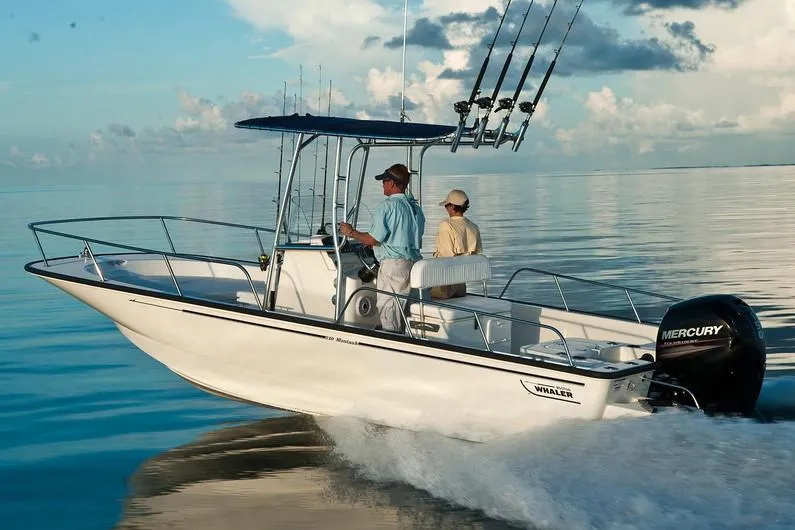 Slide: The Image of Manufacturer Provided Image: 2018 Boston Whaler 210 Montauk boat cruising on calm water. - 17