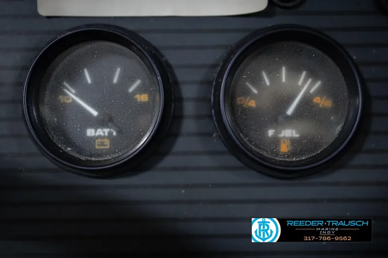 Slide: The Image of Close-up of battery and fuel gauges on a 1986 Regal Sebring 195 dashboard. - 37