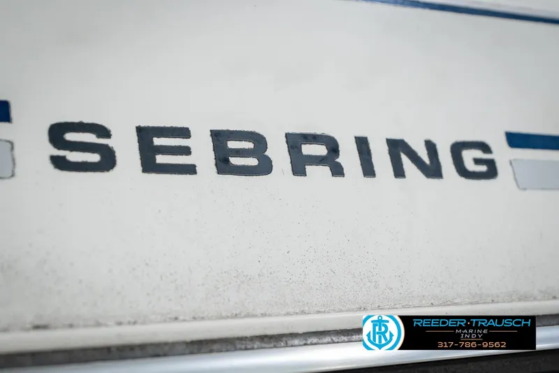 Slide: The Image of 1986 Regal Sebring 195 boat logo with Reeder-Trausch Marine contact details. - 50