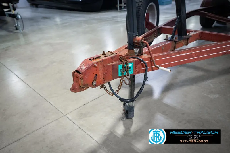 Slide: The Image of Rusty trailer hitch of a 1986 Regal Sebring 195 in a garage setting. - 51