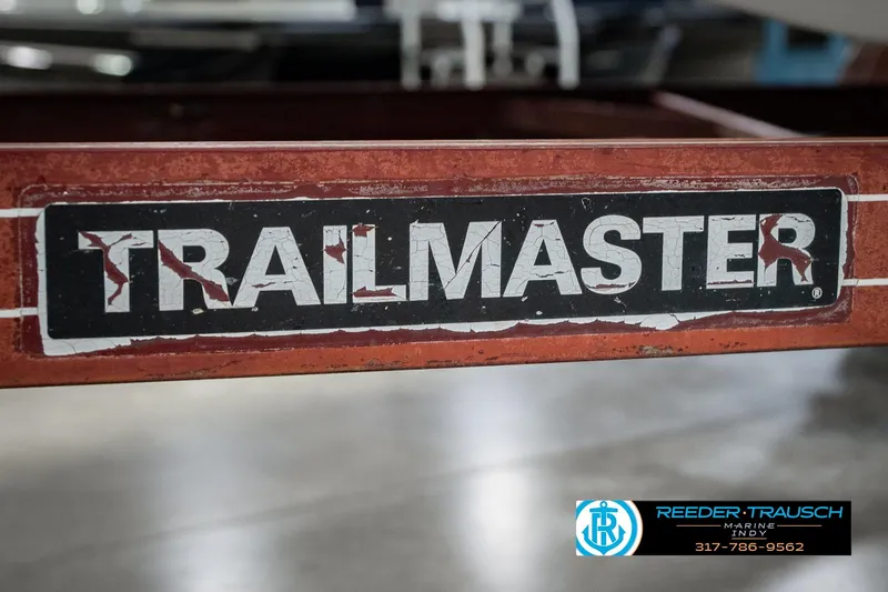 Slide: The Image of Trailmaster logo on a vintage Regal Sebring 195 trailer, 1986 model. - 52