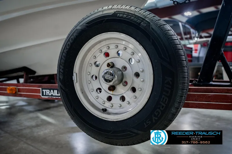 Slide: The Image of Trailer wheel of a 1986 Regal Sebring 195 boat, featuring Hankook tire. - 53