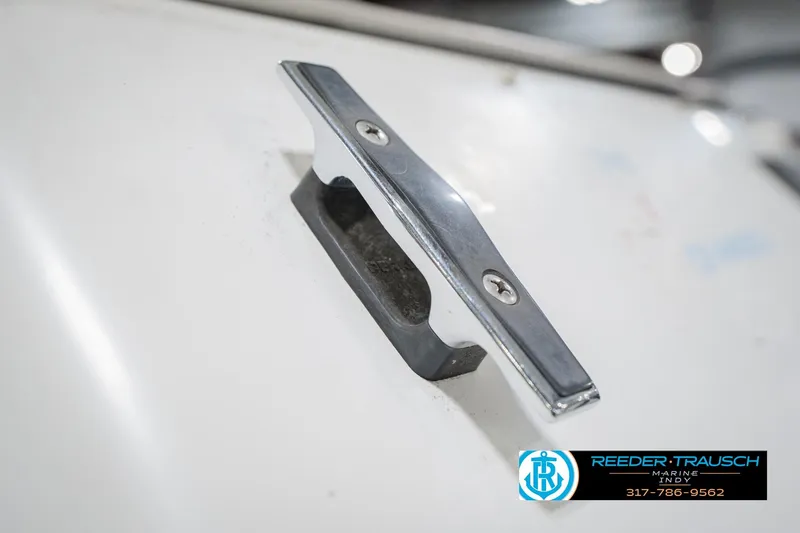 Slide: The Image of Chrome cleat on 1986 Regal Sebring 195 boat deck. - 56