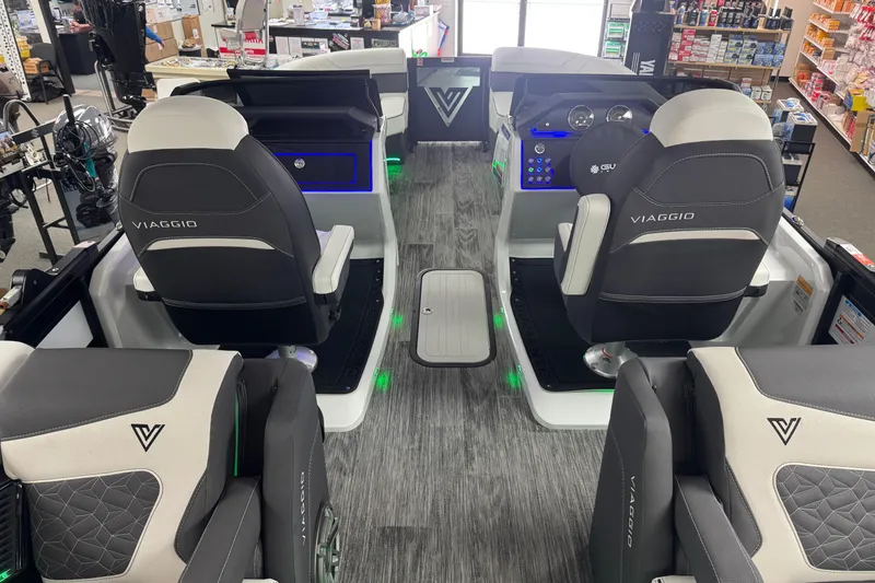 Slide: The Image of Interior of 2026 Viaggio Diamante 22UW boat with modern seating and dashboard. - 10