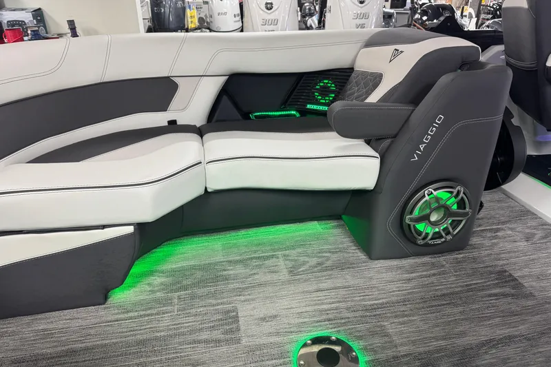 Slide: The Image of Luxurious Viaggio Diamante 22UW boat interior with ambient green lighting, 2026 model. - 11
