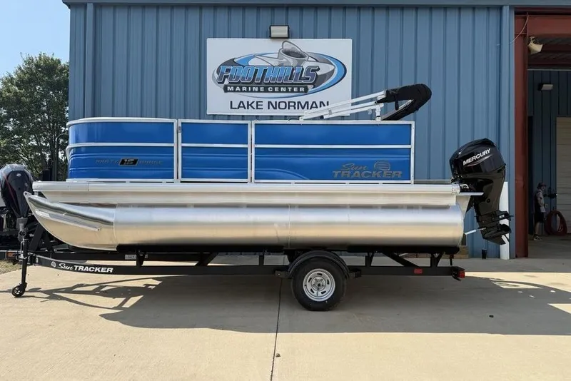 The Image of 2026 Sun Tracker Party Barge 16 DLX pontoon boat at Foothills Marine Center. - 1