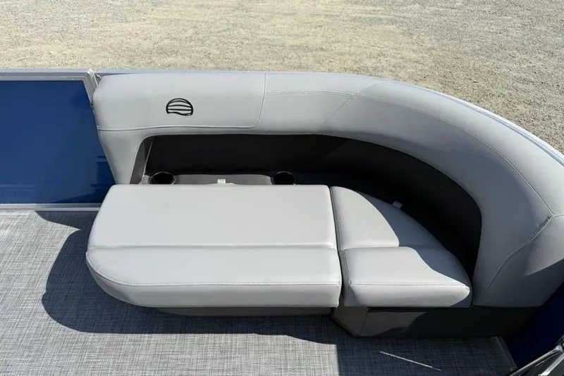 Slide: The Image of 2026 Sun Tracker Party Barge 16 DLX pontoon boat seating with gray upholstery. - 3